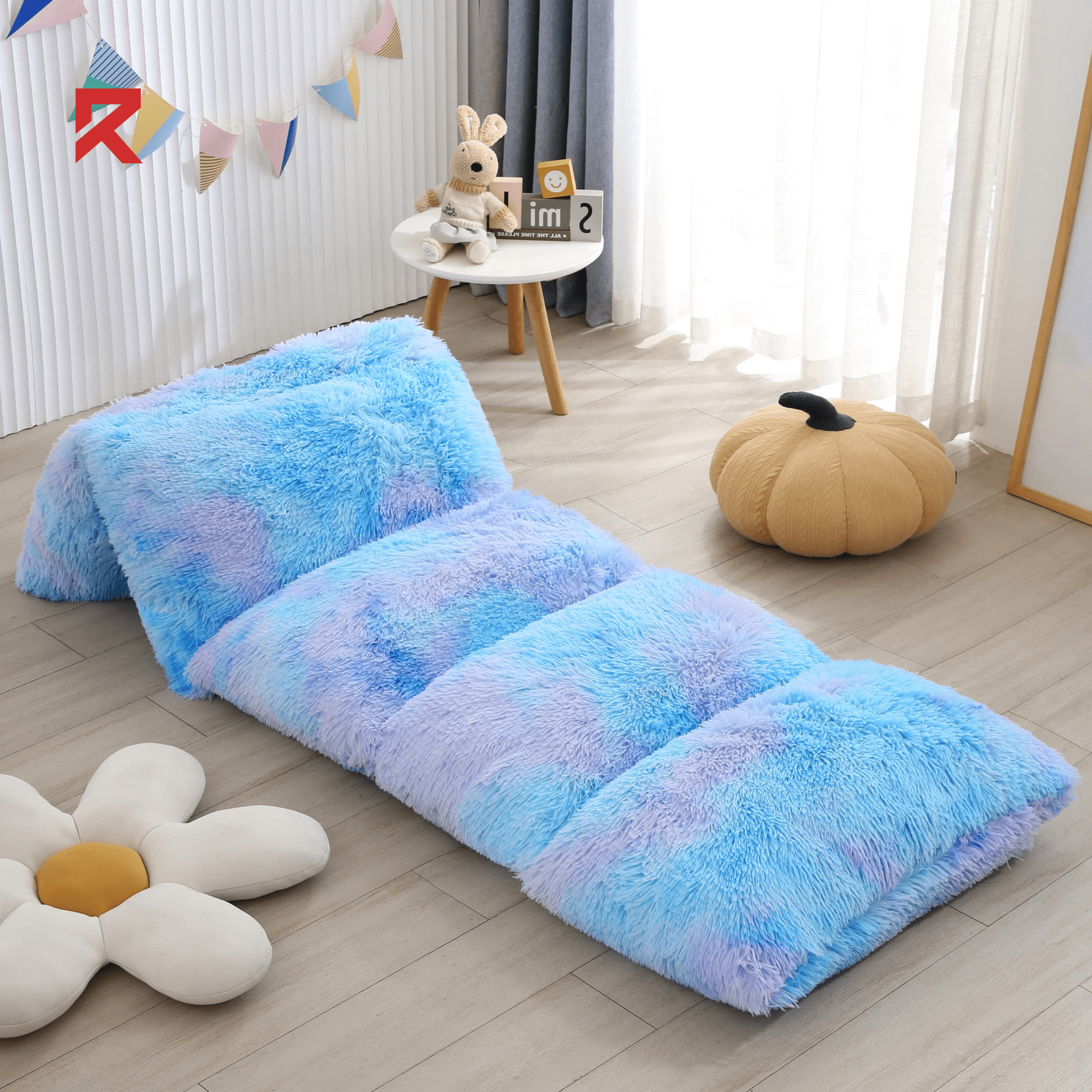 The fluffy floor pillow lounger which is one of the charismas gifts for kids
