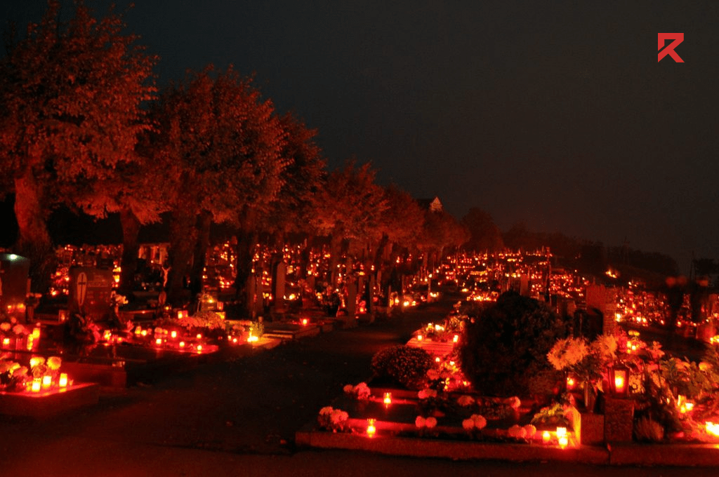 This is Belgium park at night time which is decorated with candles and lights for Halloween