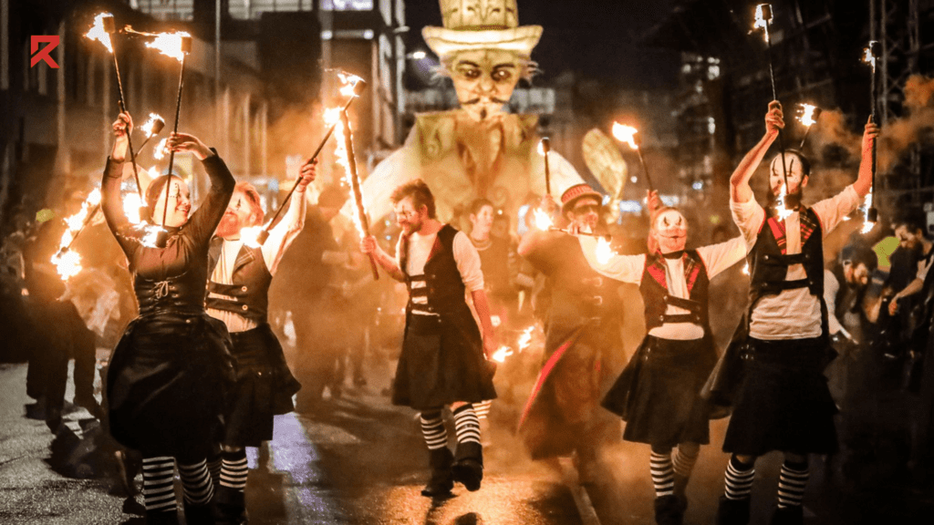 People are out using fire sticks and dancing in Halloween festival